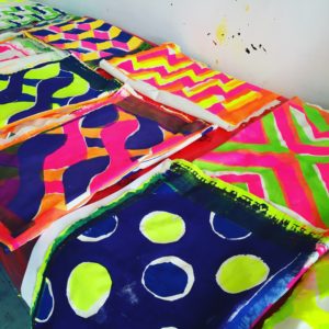 Colourful screenprintings of dots and stripes