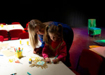 Photo of a woman and child doing arts activities