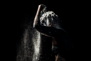 Lead image for Oreo - black and white image of a woman with white powder raining down on her